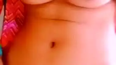 Desi wife shows off small breasts and hairy cunt in online XXX show