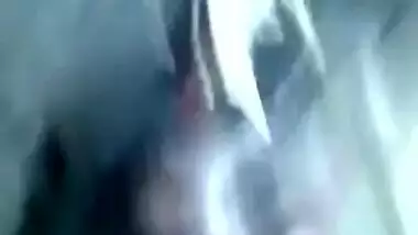 Naked Desi with dark skin does XXX porn on her own in the dark room