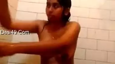 Naked Desi angel sneaks in shower to relax and finger her XXX peach