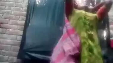 Bengali village girl bathing outdoors clip