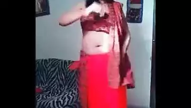 Female performs an Indian sex belly dance in a XXX manner on camera