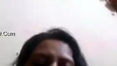 Desi mom simply sits in front of camera and talks with serious face