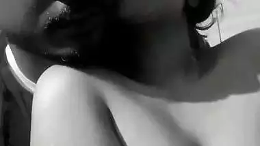 Girlfriend smoking cigarette with boob press