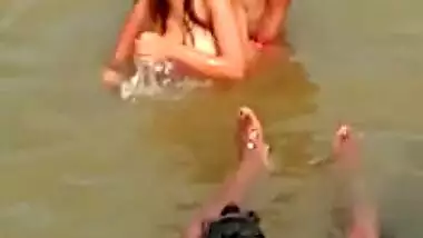 Desi girl enjoying river bath with group of boys
