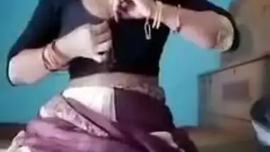 Guy films through hole how Indian woman provocatively touches XXX clit