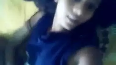 Teen Desi beauty holds the camera and shows off her shaved XXX twat